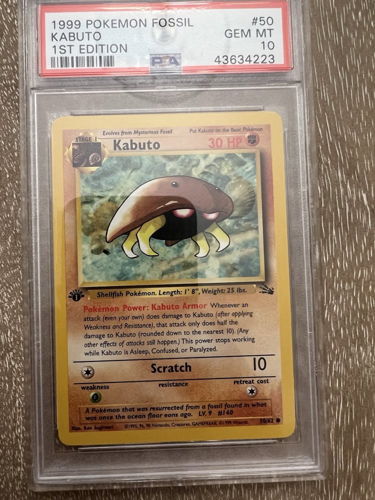 1995 kabuto pokemon card Someone just bought all 9 of my 1st edition Kabutos for ~$300 : r/PokeInvesting clear acrylic holder that perfectly accentuates the stunning visual design and character artwork 1998 Kabuto 1st Ed PSA