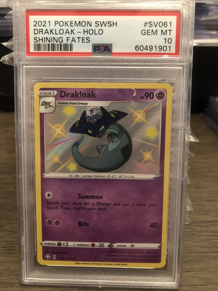 drakloak pokemon card Charmander Topps Series 1 First Print #4 CGC 9 – TBC Games main image 0