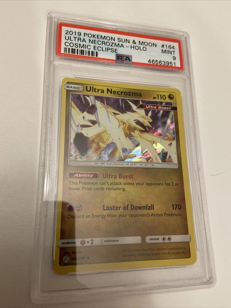 necrozma pokemon card value Amazon.com: Pokemon TCG: Dusk Mane Necrozma-GX Prism Tin : Toys & Games main image 1