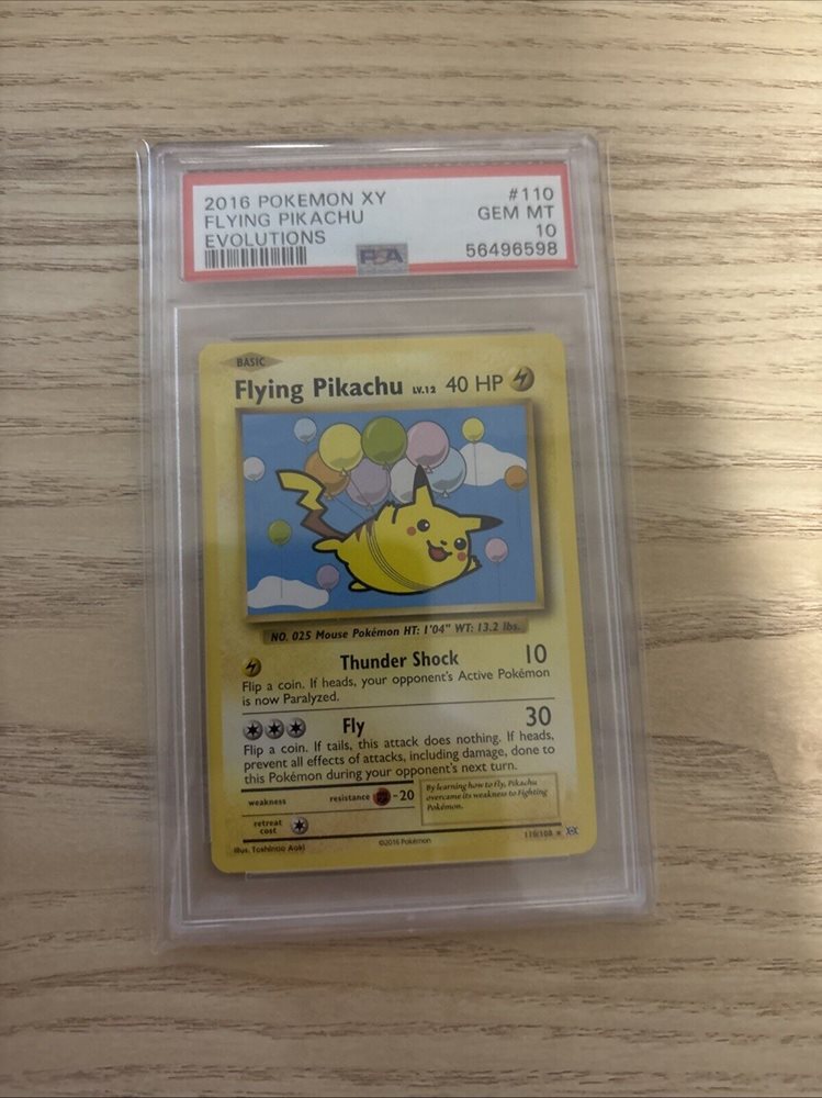 pokemon detective pikachu ditto card Evolutions 111 Surfing Pikachu CGC 8.5 - Subgrades